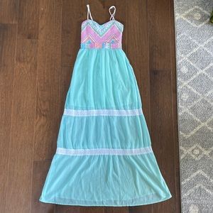 Flying tomato maxi dress has liner though mid thigh. Size medium